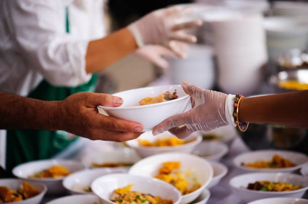 Live to Serve donate food to hungry people, concept of poverty and hunger